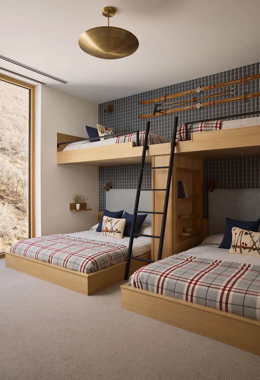 Custom built-in wood bunk beds with a ladder and bookshelf