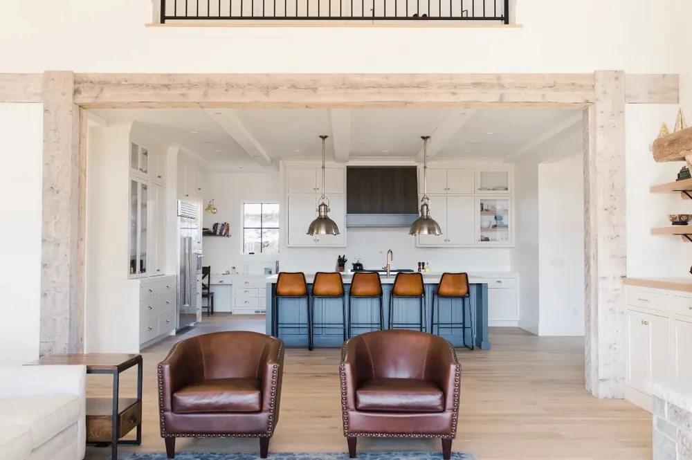 Great room framed with whitewashed wood beams